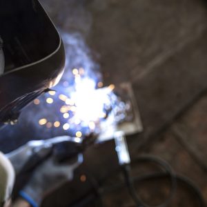 male-mechanic-working-his-workshop